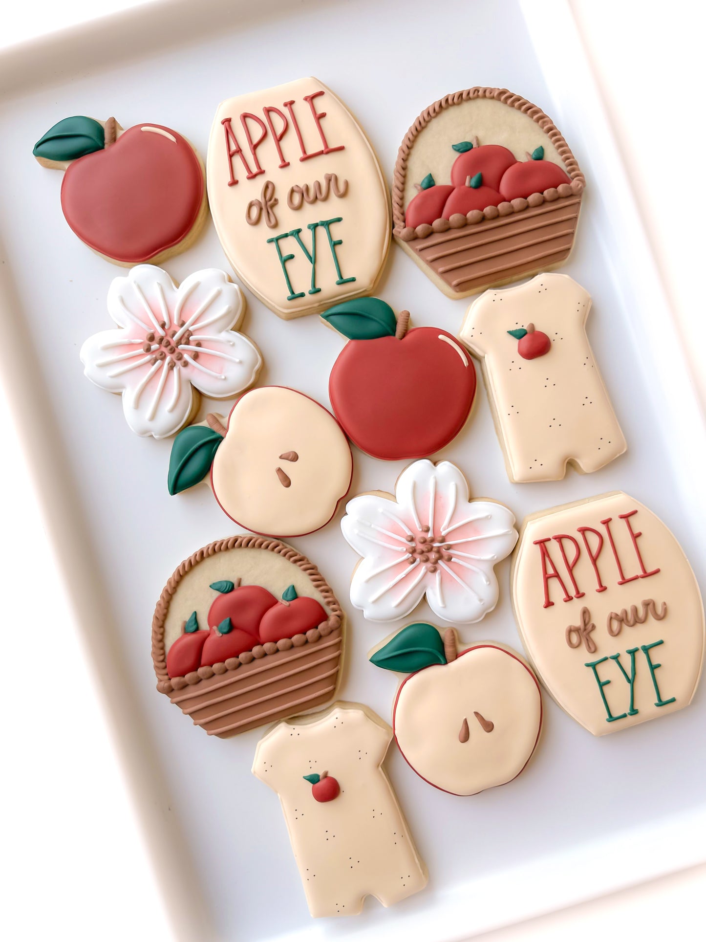 apple of our eye baby shower cookies, apple cookies, apple blossom flower cookies, apple basket, apple romper