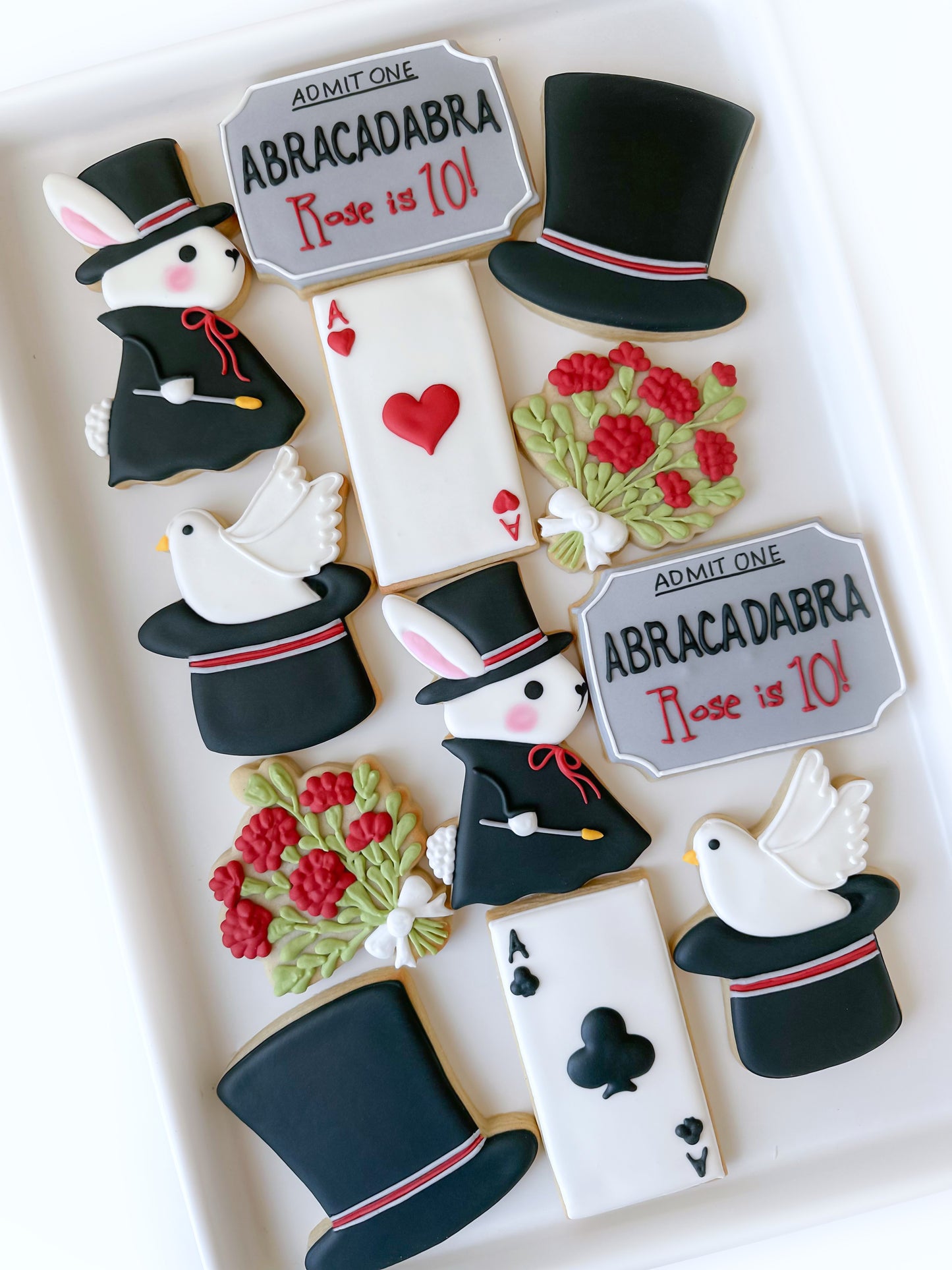Abracadabra birthday, magic show, rabbit in hat, magician's bouquet, ace of spades, ace of hearts, dove in magician's hat, bunny magician, ace of clubs, ace of diamonds