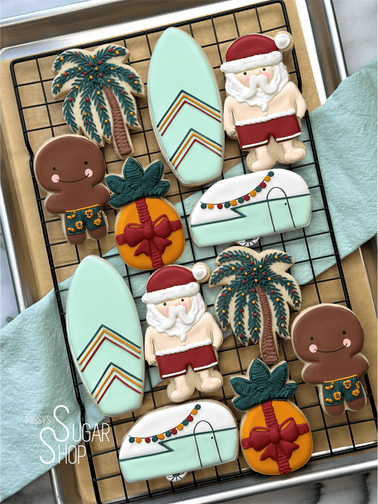 Christmas in July cookies, gingerbread man cookies, hawaiian cookies, palm tree christmas lights, surfboard cookies, pineapple, santa in shorts, camper cookies, christmas cookies, summer vacation cookies, summer beach cookies