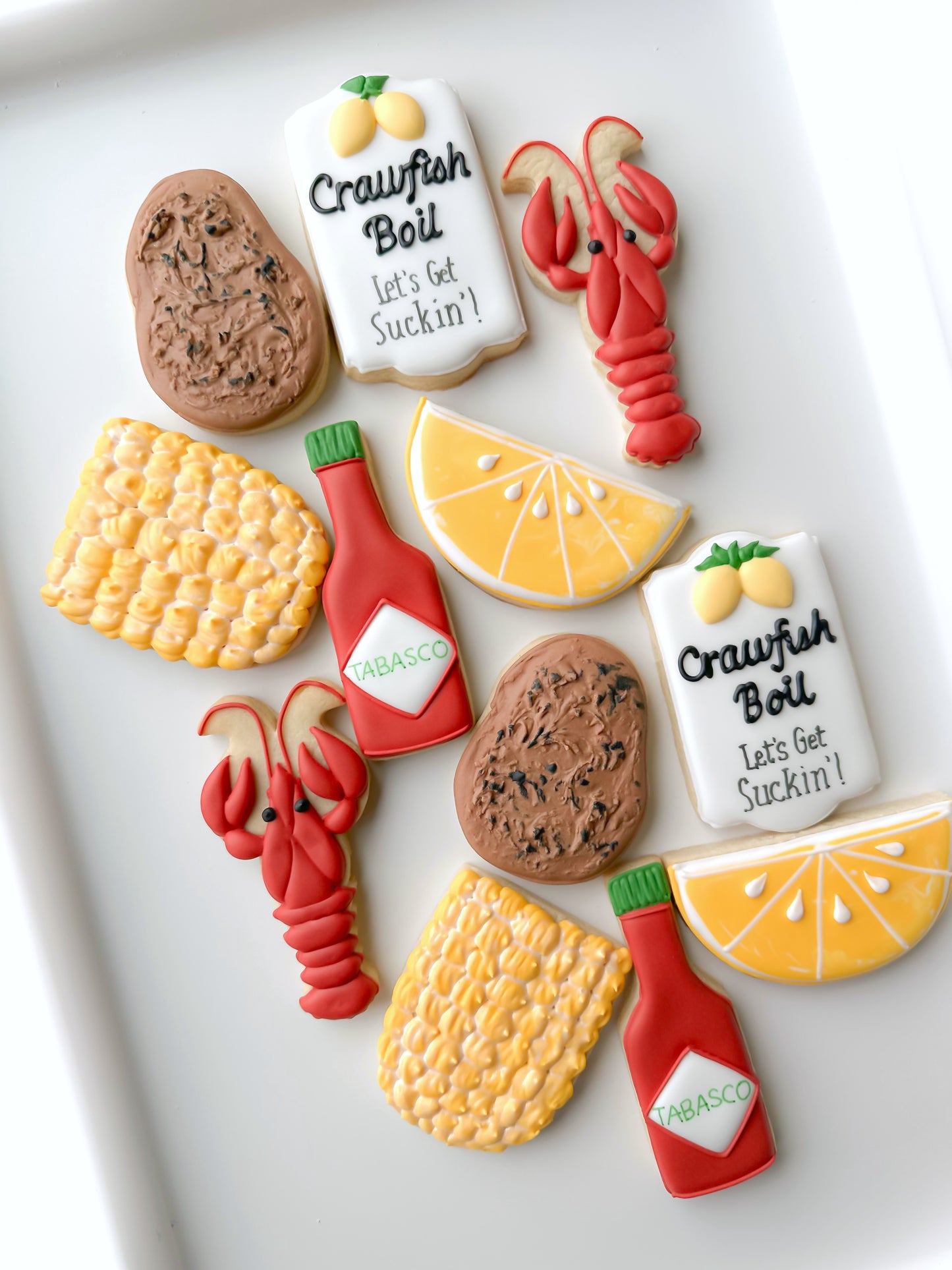 lobster, corn on the cob, lemon, potato, lobster boil, tabasco shrimp crawfish boil decorated cookies