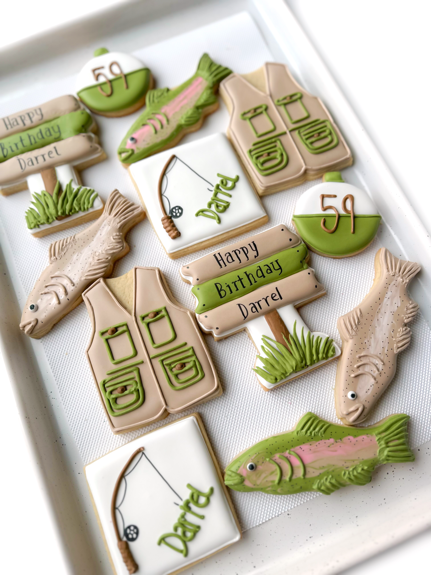 Gone fishing birthday cookies, fisherman cookies, fishing vest, rainbow trout, brown trout, fishing bobble, hook line and sinker fishing cookies
