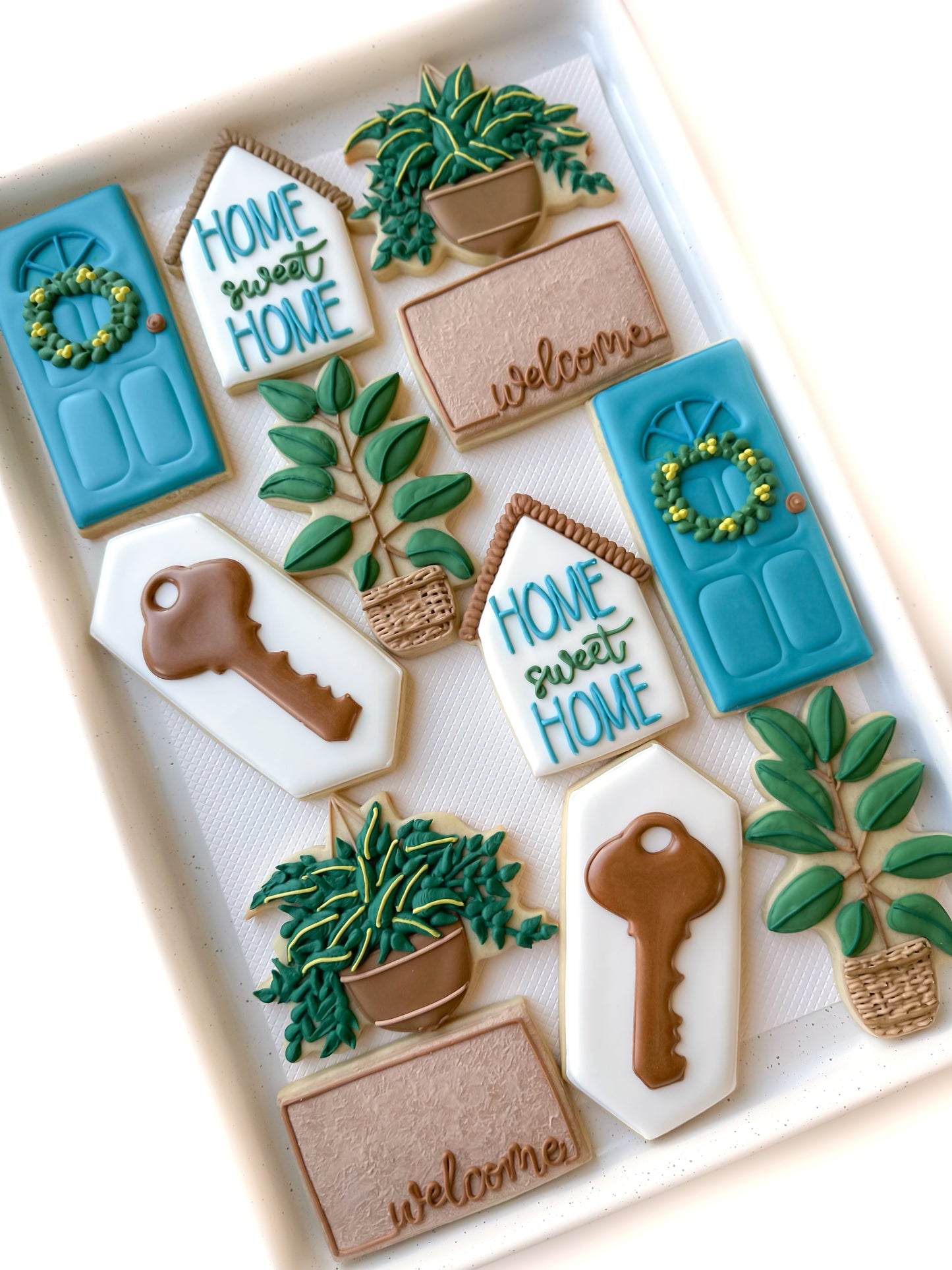 home sweet home house, plant, flowering plant, house key, welcome door mat, plant, new home cookie gifts, real estate cookies