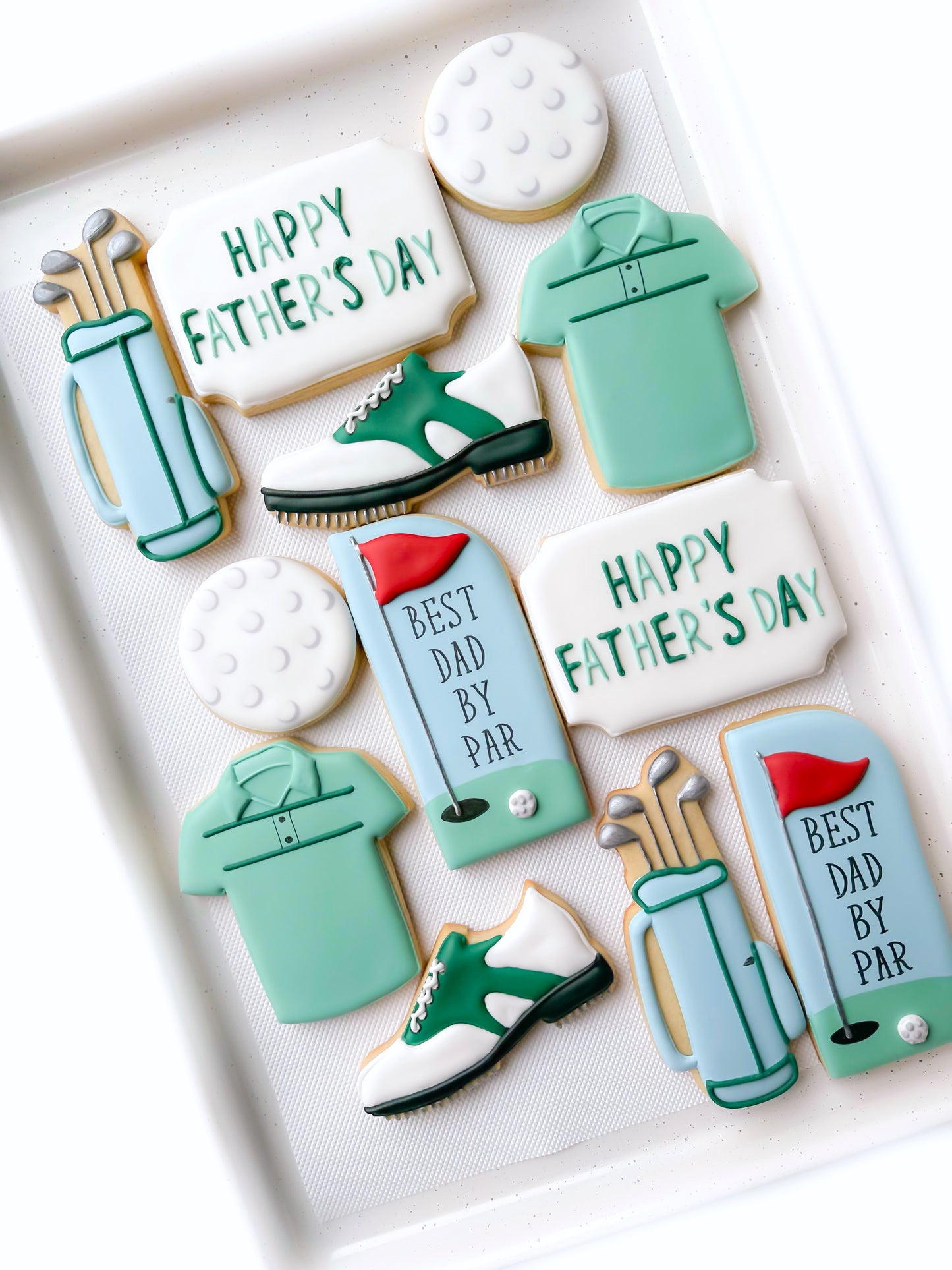 golf club, golf shirt, golf ball, and golf course, golf bag, tee time, father's day golf cookies, golf shoe