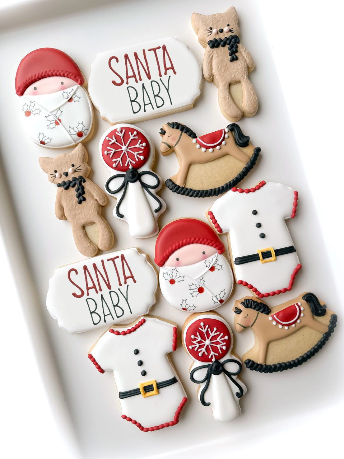 santa baby first christmas decorated cookies