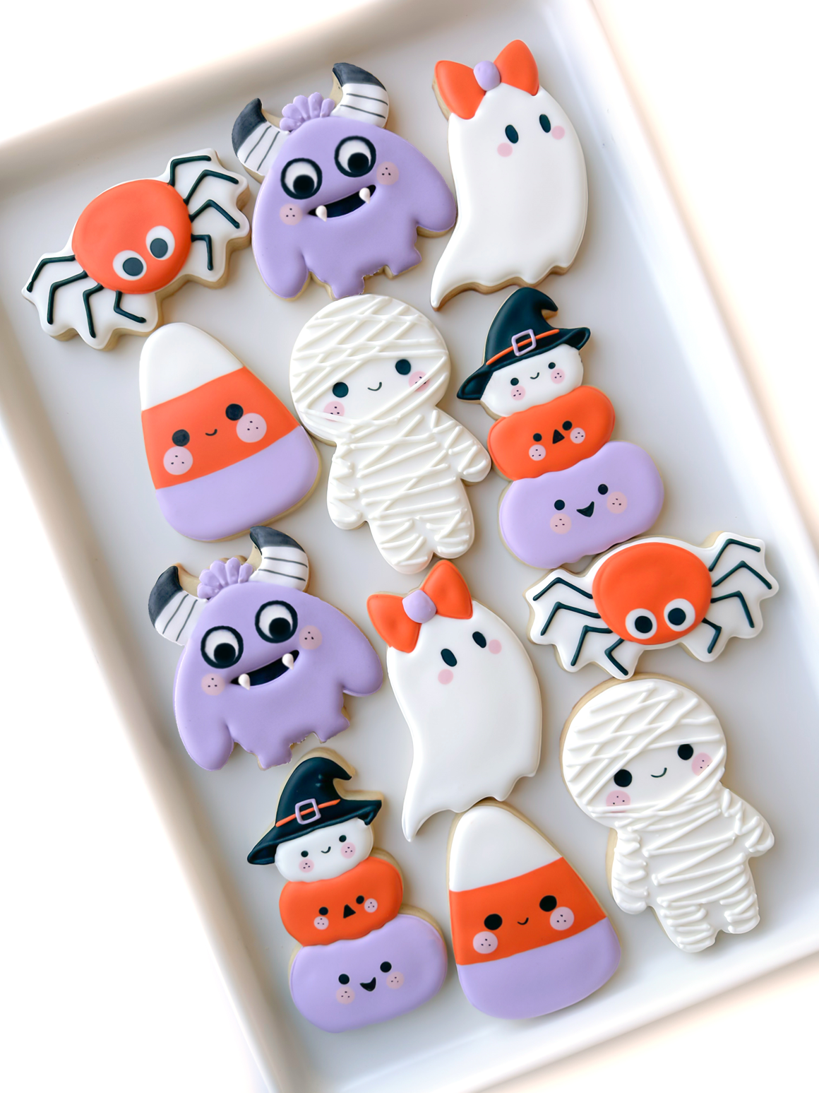 ghost with bow, pumpkin stack, candy corn, mummy, spider, monster costume, halloween party favors, cute halloween cookies