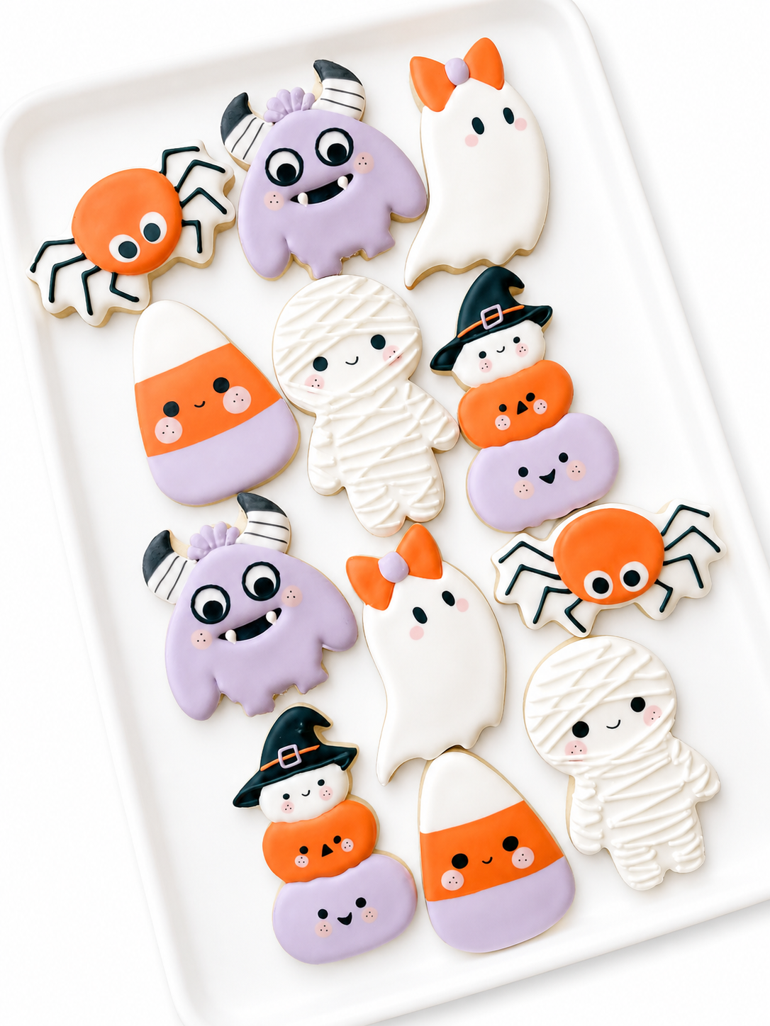 ghost with bow, pumpkin stack, candy corn, mummy, spider, monster costume, halloween party favors, cute halloween cookies