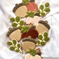 Acorn, pumpkin with flowers, fall greenery, autumn vibes, fall florals cookies