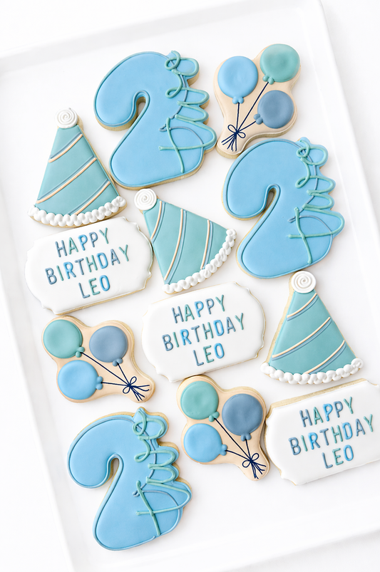 birthday party hats balloons decorated cookie