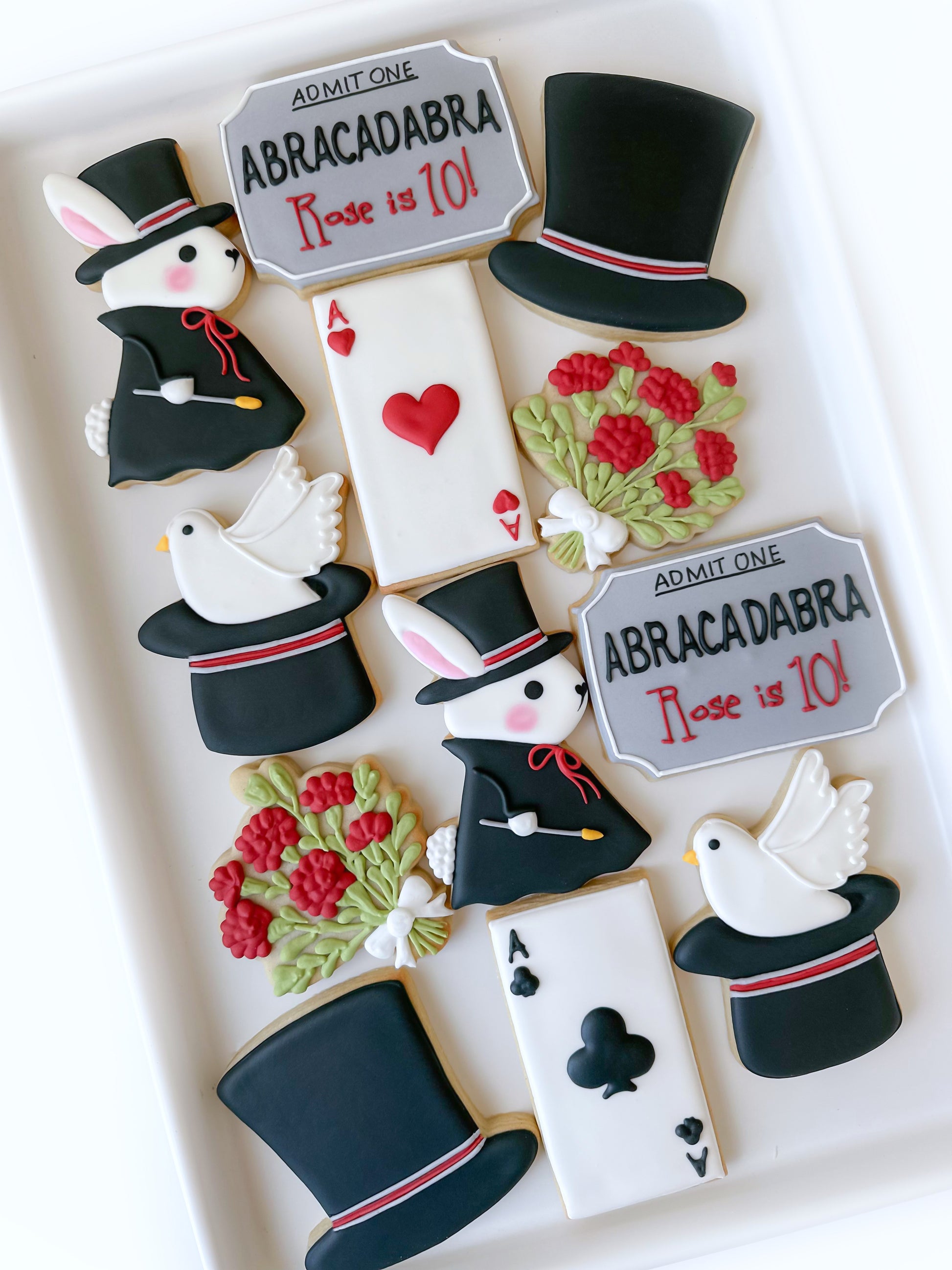 Abracadabra birthday, magic show, rabbit in hat, magician's bouquet, ace of spades, ace of hearts, dove in magician's hat, bunny magician, ace of clubs, ace of diamonds