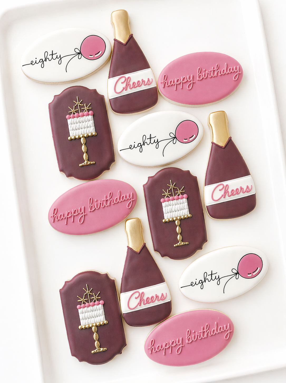 happy birthday, balloons, champagne cheers, birthday cake present balloon arch, press for champagne, champagne bottle and glass birthday cookies