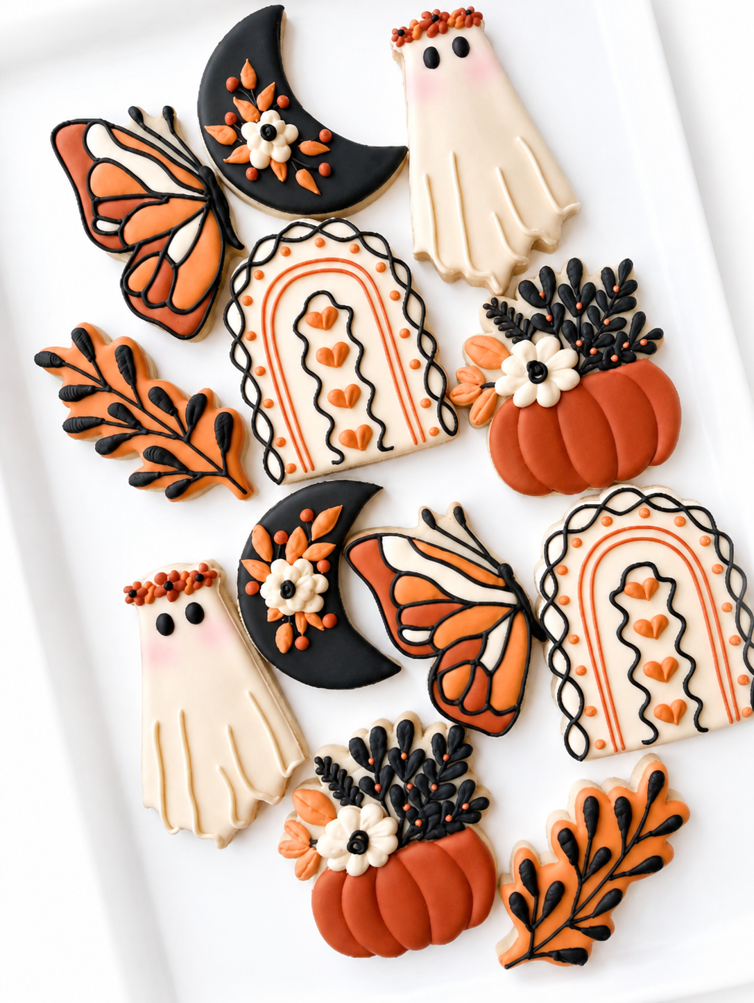 boho halloween, boo, boho rainbow, pumpkin tree with florals, moth, pumpkin with flowers, ghost with flowers, halloween cookies
