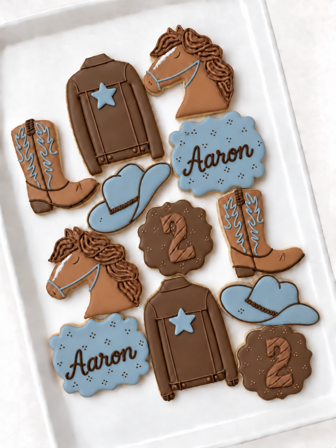 cowgirl cowboy birthday decorated cookies horse jean denim jacket cowboy boot cowboy hat
