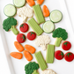 eat your veggies, cauliflower, broccoli, celery sticks, baby carrots, cherry tomatoes, cucumber slice decorated cookies