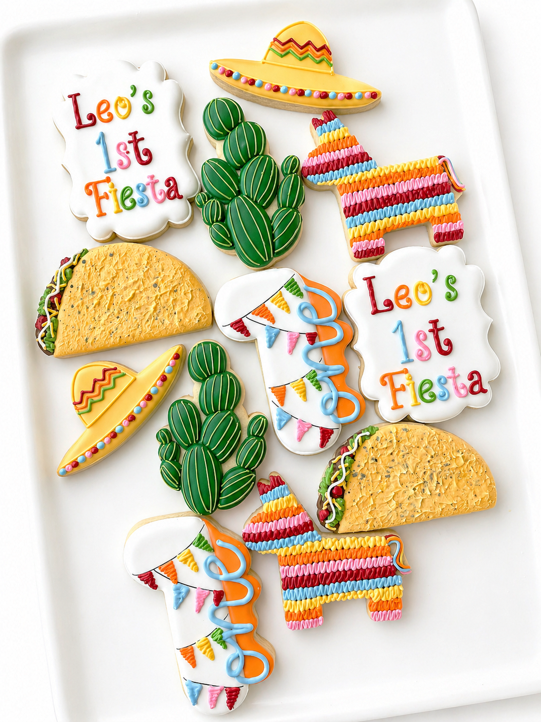 first fiesta taco sombrero cactus pinata first birthday cookies