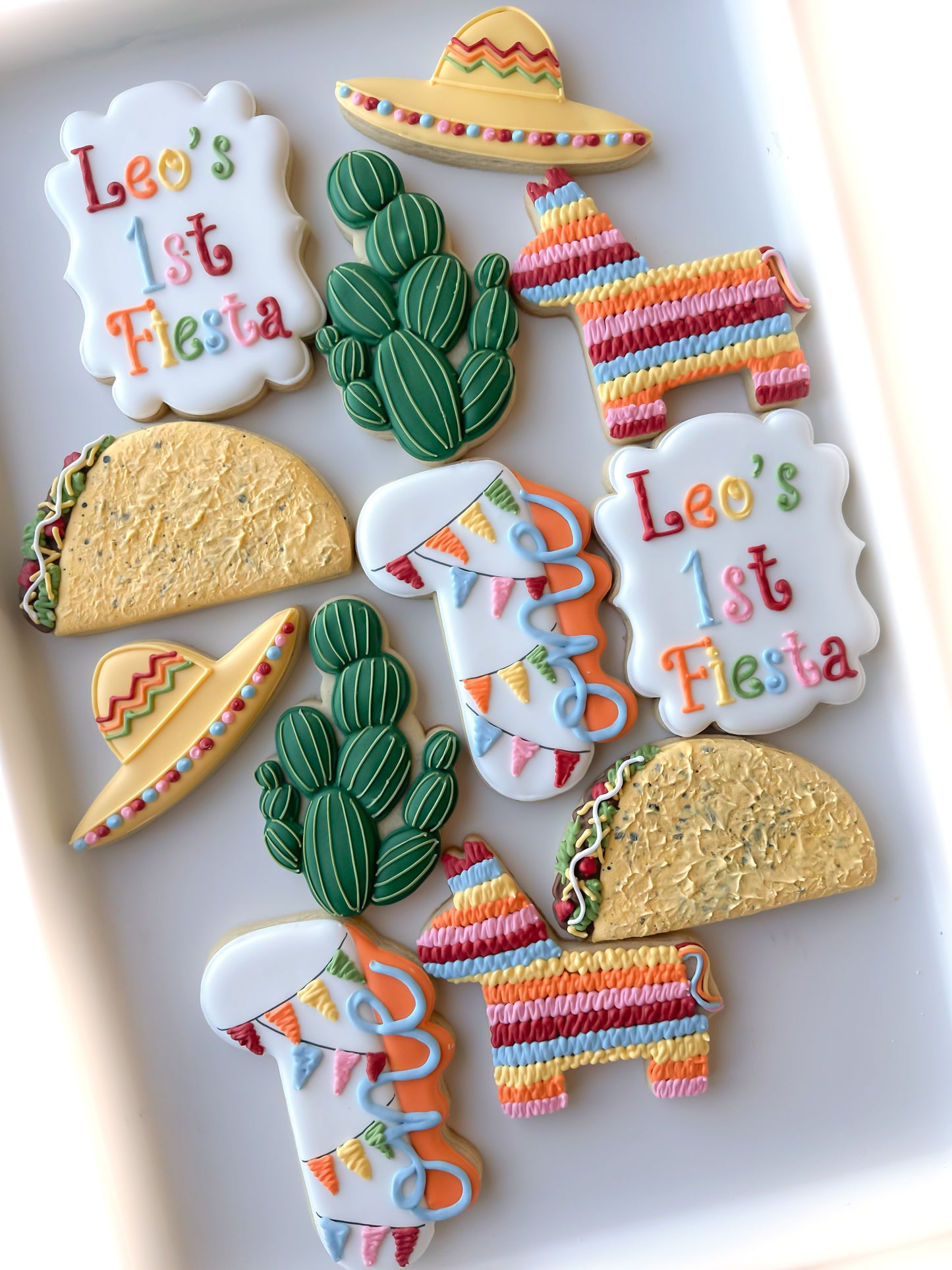 first fiesta taco sombrero cactus pinata first birthday cookies