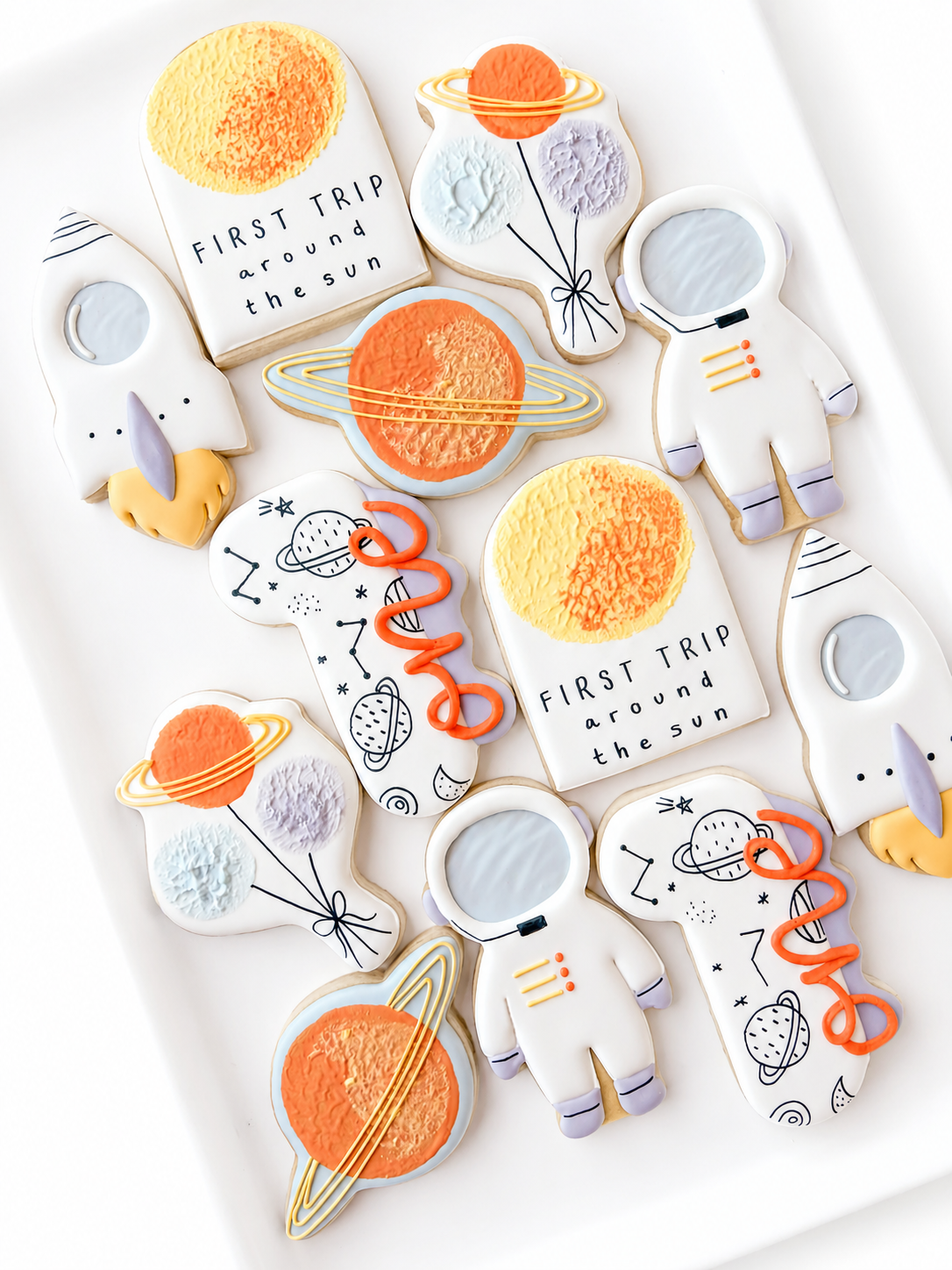 first trip around the son decorated cookies astronaut rocket first birthday balloons saturn