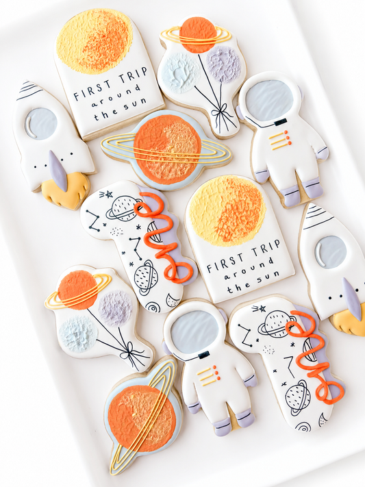 first trip around the son decorated cookies astronaut rocket first birthday balloons saturn