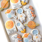 first trip around the son decorated cookies astronaut rocket first birthday balloons saturn