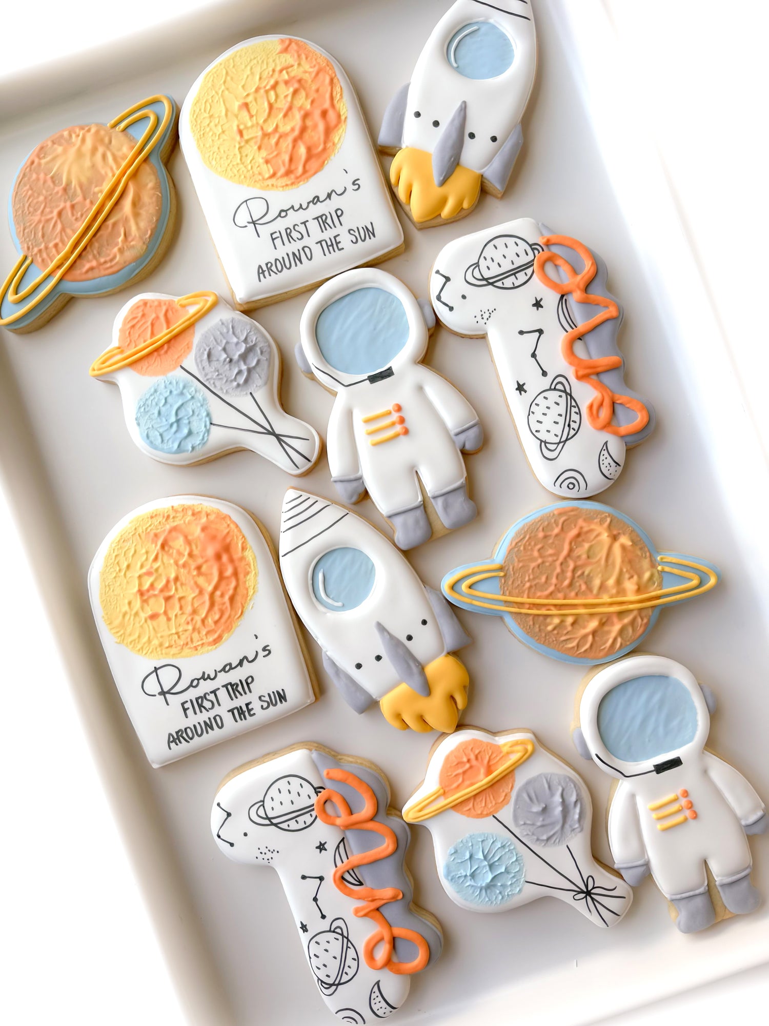 first trip around the son decorated cookies astronaut rocket first birthday balloons saturn