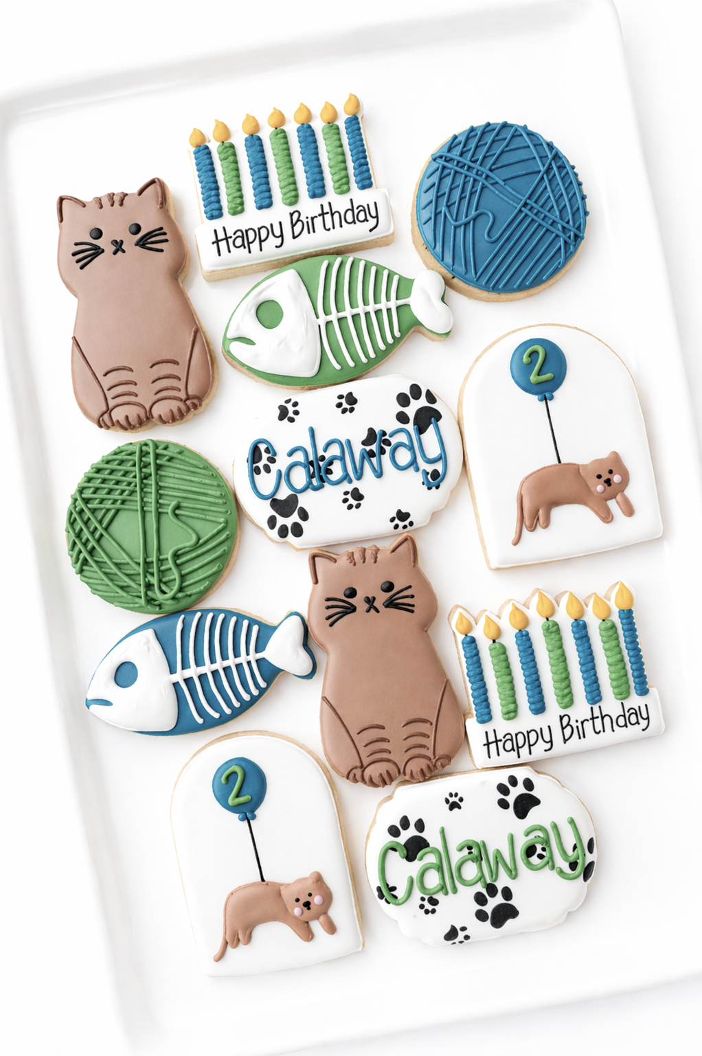 cat, fish bones, ball of yarn, birthday candles, cat with balloon, name plate, age plate kids birthday decorated cookies