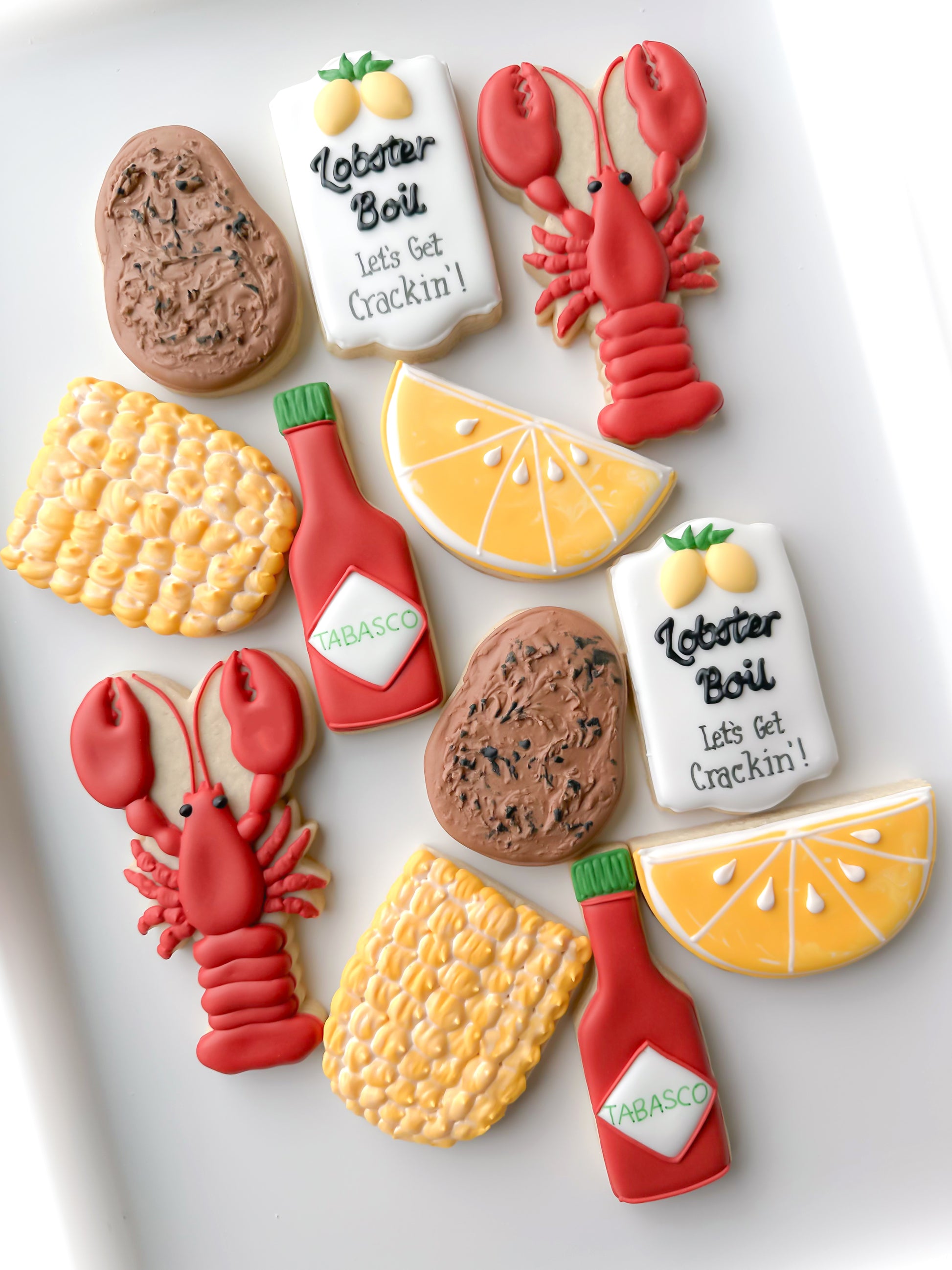 lobster, corn on the cob, lemon, potato, lobster boil, tabasco shrimp crawfish boil decorated cookies