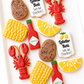 lobster, corn on the cob, lemon, potato, lobster boil, tabasco shrimp crawfish boil decorated cookies