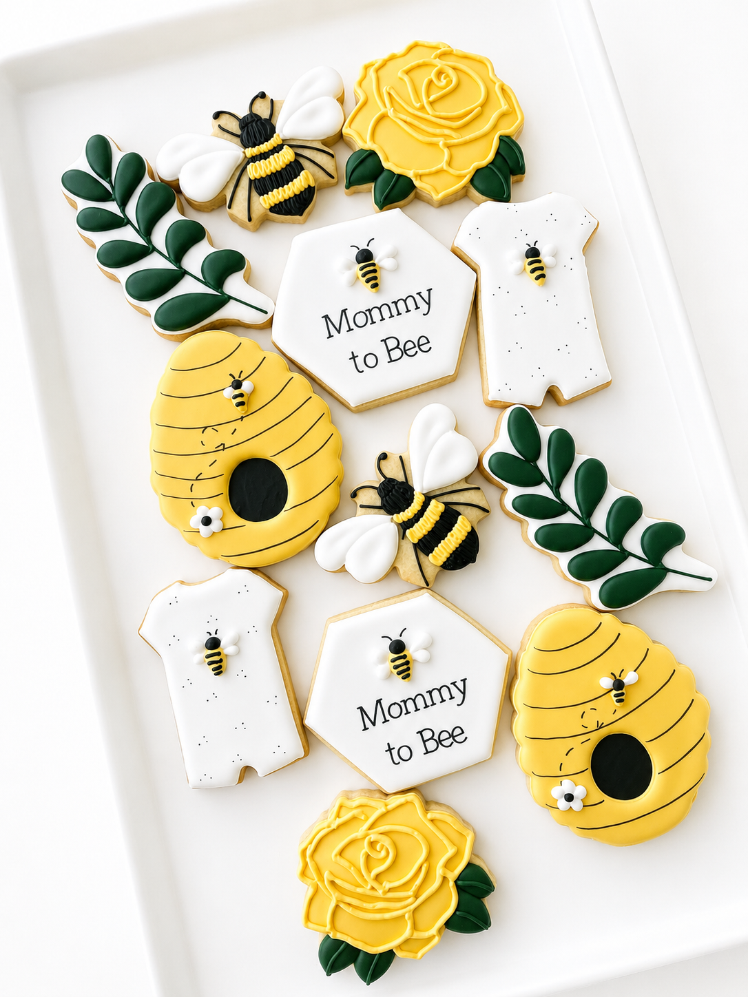 bumble bee, daisy, romper, rattle, honeycomb, mommy to bee baby shower cookies, beehive, what will baby bee, leaves and flowers bees