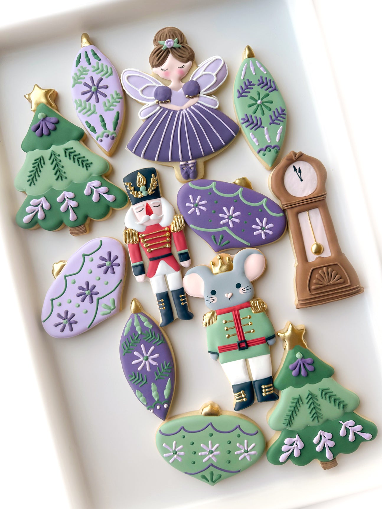 sugar plum fairy, grandfather clock, rat king, nutcracker soldier, christmas tree, rocking horse.