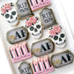 sugar skull with flowers, rip tombstone, casket with flowers, happy birthday candles, over the hill birthday cookies, 40th birthday cookies