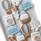 greatest adventure yet baby shower cookies Hot air balloon, cloud, adventure awaits, luggage, compass, passport, air mail envelope, bon voyage with plane, and earth