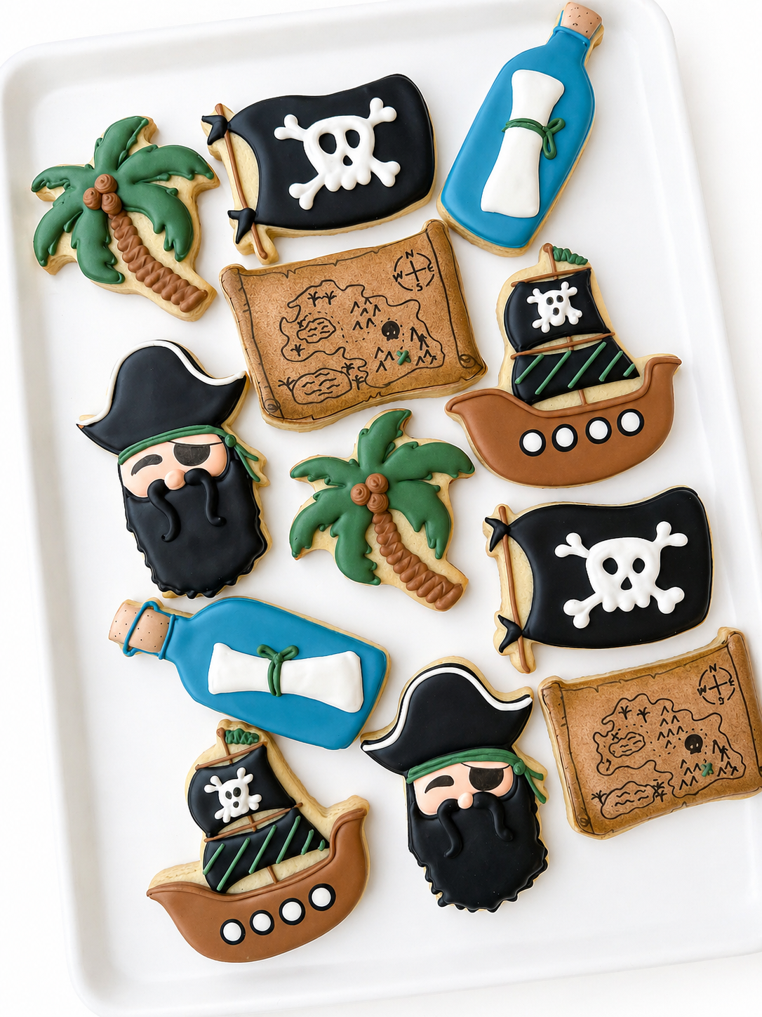 pirate ship palm tree message in a bottle birthday cookies