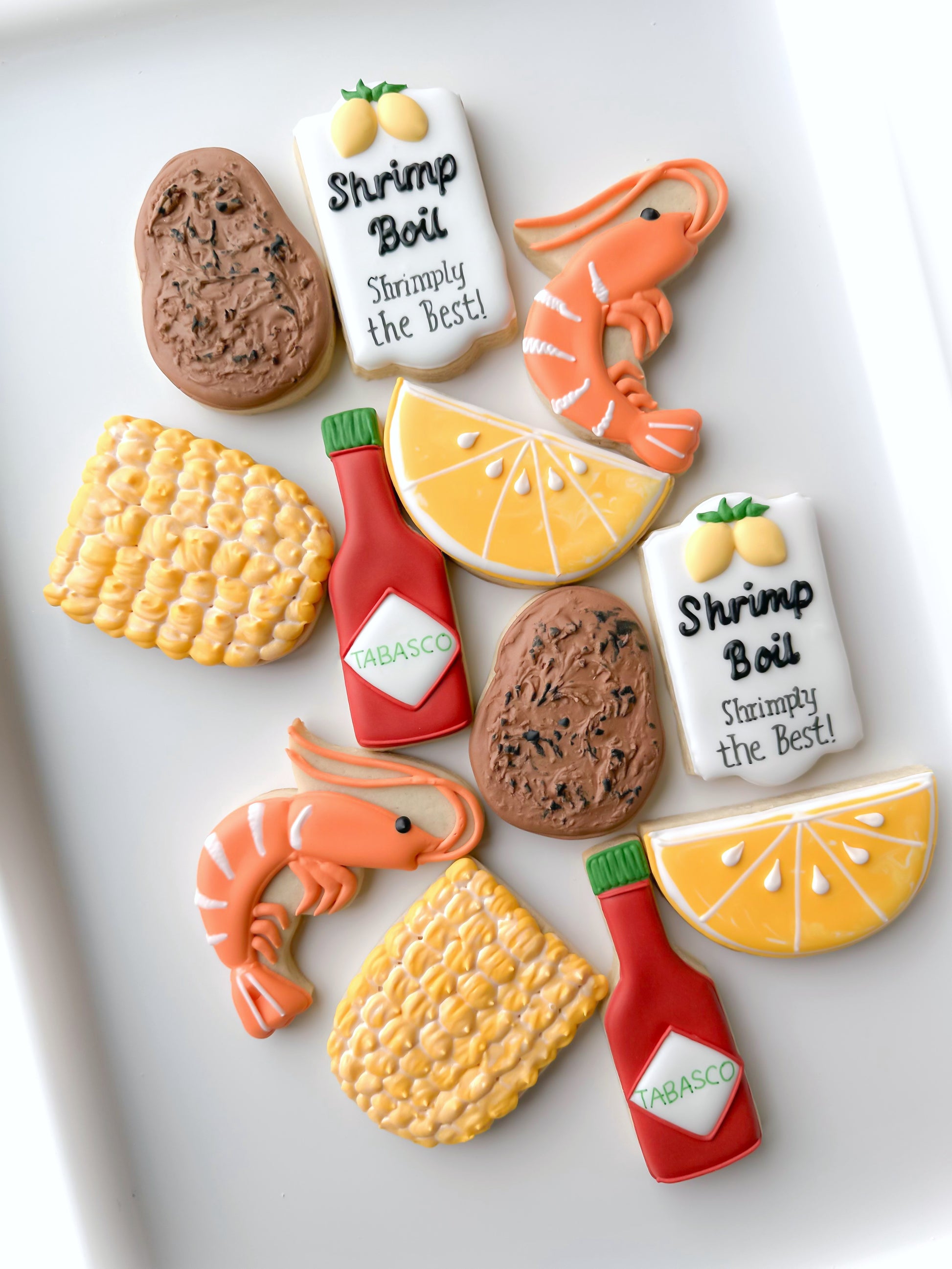 lobster, corn on the cob, lemon, potato, lobster boil, tabasco shrimp crawfish boil decorated cookies