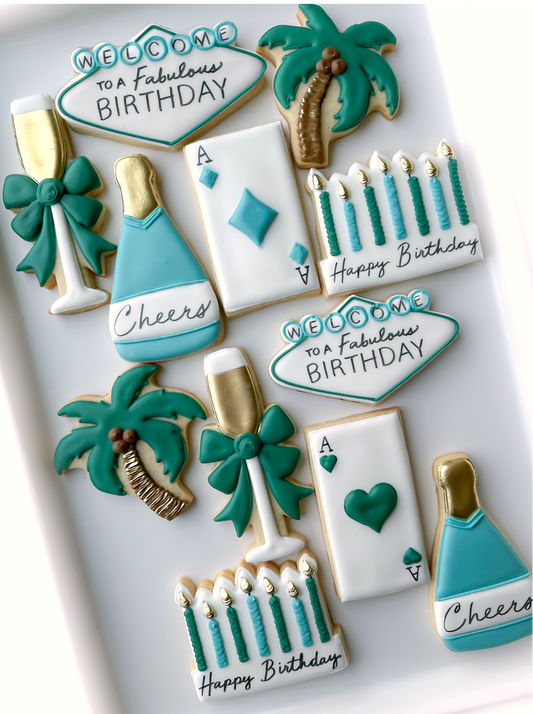 happy birthday, balloons, champagne cheers, fabulous vegas cookies, vegas birthday weekend, press for champagne, champagne bottle and glass birthday cookies, palm tree cookies, birthday candle cookies