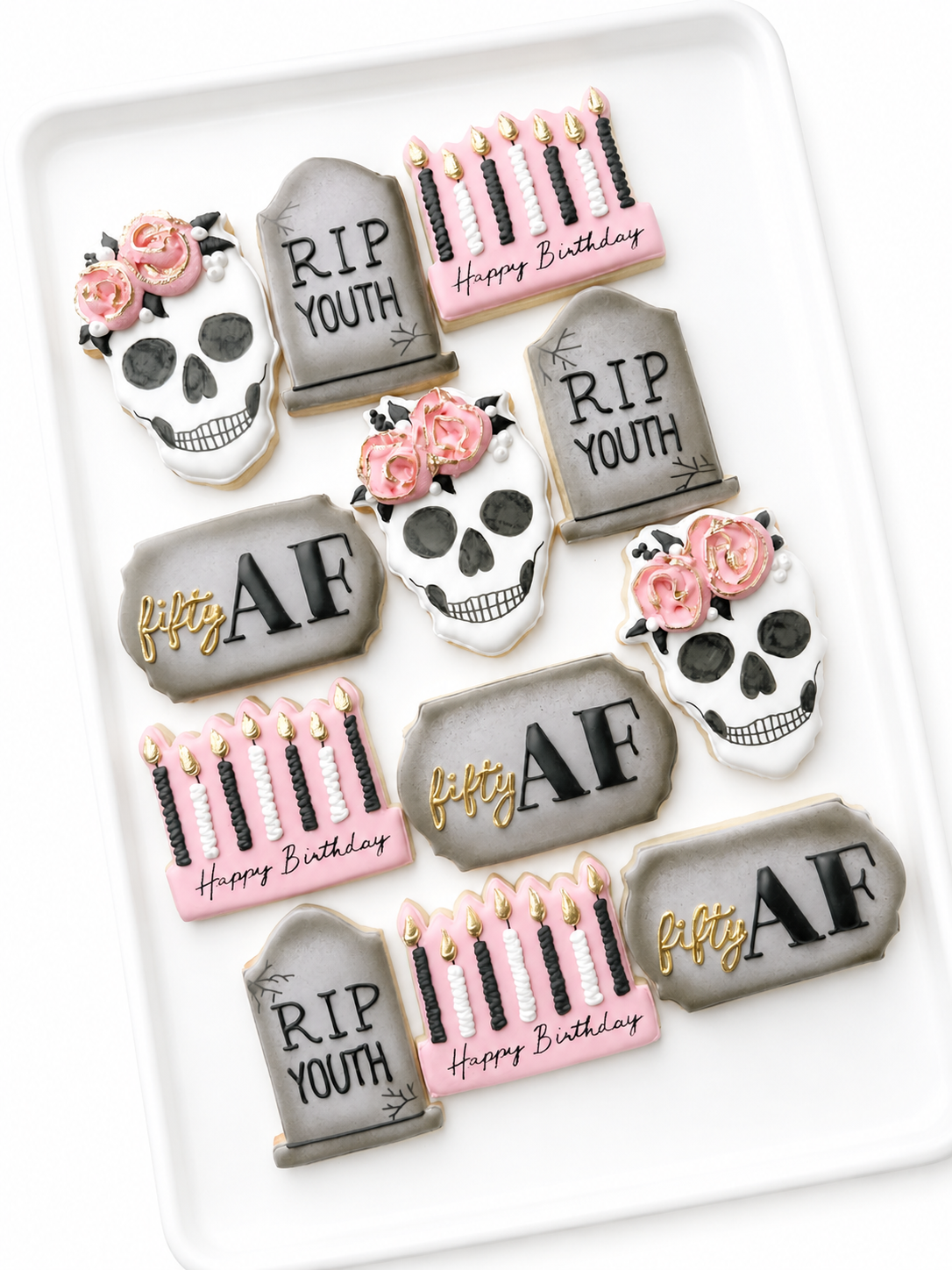 sugar skull with flowers, rip tombstone, casket with flowers, happy birthday candles, over the hill birthday cookies, 40th birthday cookies