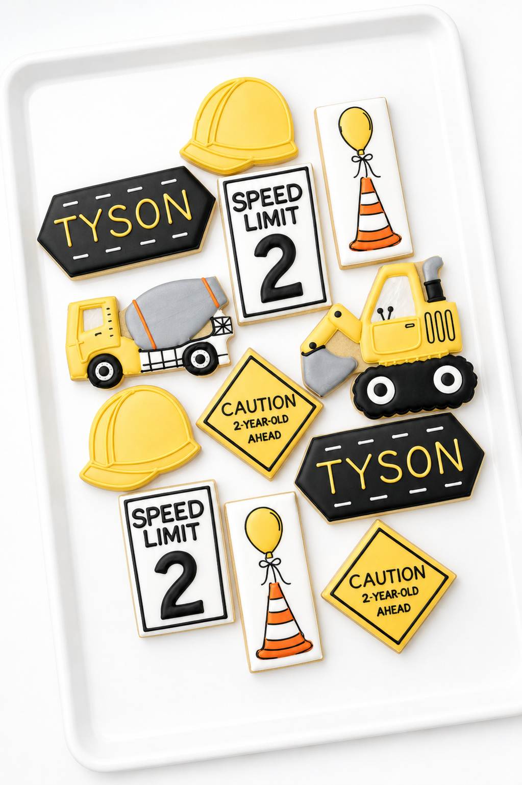 construction trucks, speed limit 4, construction zone, construction cone with balloon, cement mixer, excavator, caution 4 year old ahead